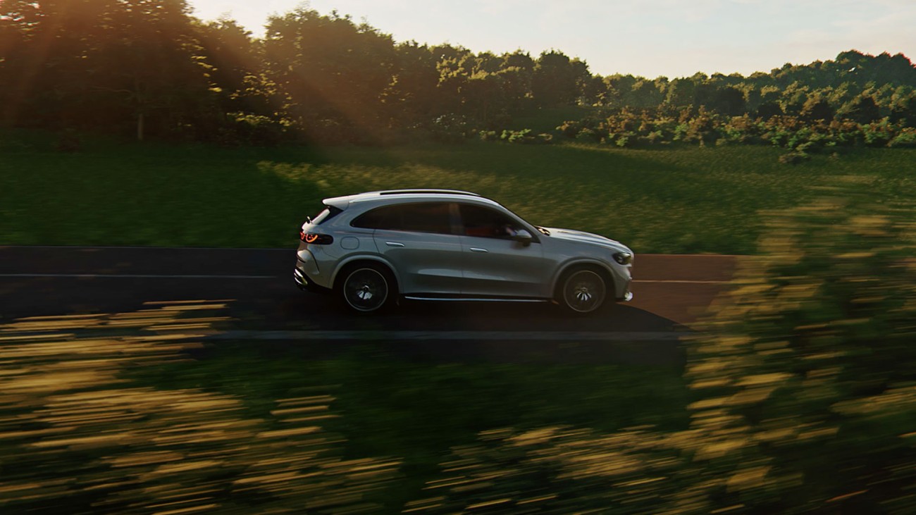 
			Ein elektrischer Mercedes-Benz GLC f�hrt �ber eine Landstra�e durch eine gr�ne Landschaft. Das Bild steht f�r lokal emissionsfreies Fahren im Alltag.
		